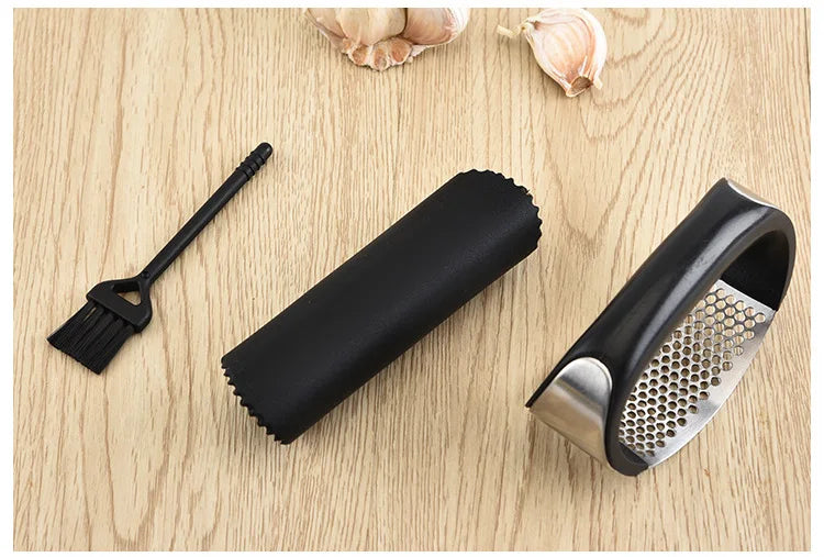 1Pcs Stainless Steel Garlic Food Crusher Manual Garlic Press Peeler Brush Vegetables Fruit Tools Multifunctional Kitchen Gadget